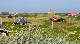 Danish landscape with traditional wooden houses.