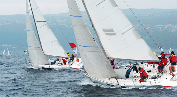 Sailboats racing in a competition.