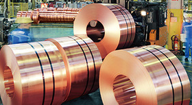 View of rolls of processed copper in a factory.